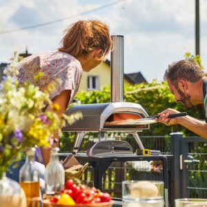 Ooni Karu 12 multi fuel pizza oven cooking pizza