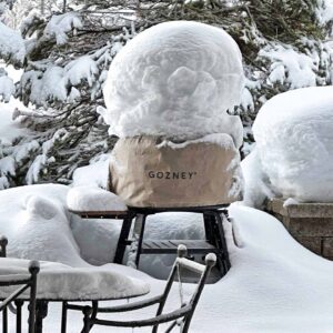 Gozney Dome pizza oven cover in snow