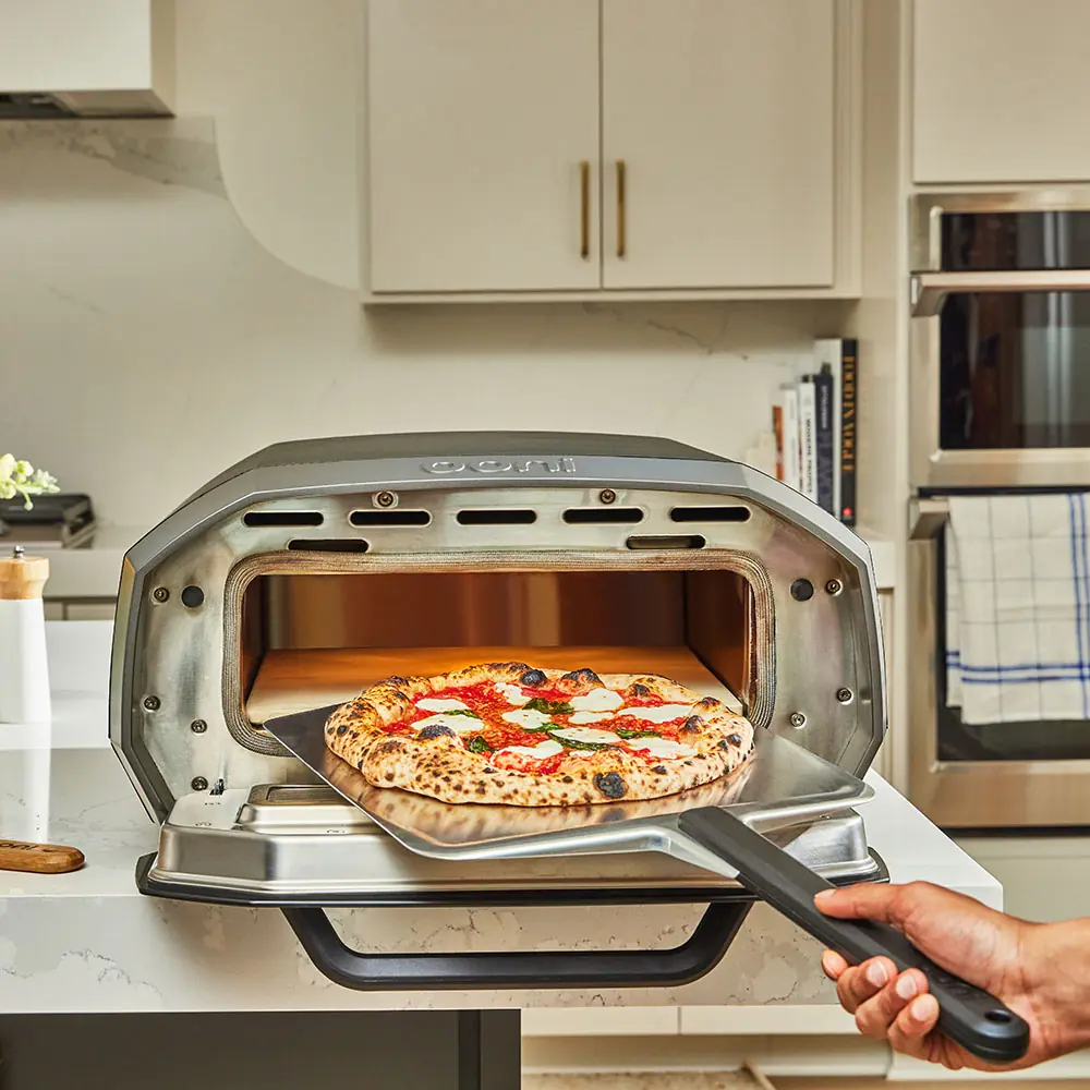 Ooni Volt 12 Electric Pizza Oven - cooking pizza